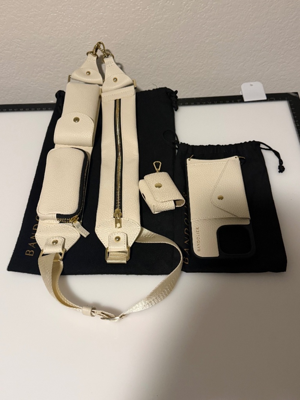 Billie Utility Crossbody with a 16 Pro Max and AirPods Case